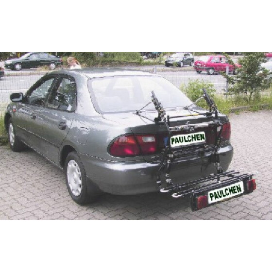 Paulchen Heckträger - Mazda 323 S Stufenheck ab 08/1994-09/1998 - mit optionalen Trägersystem, Schienensystem und Zubehör